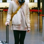 Travel Bans - Woman Wearing Face Mask at Airport