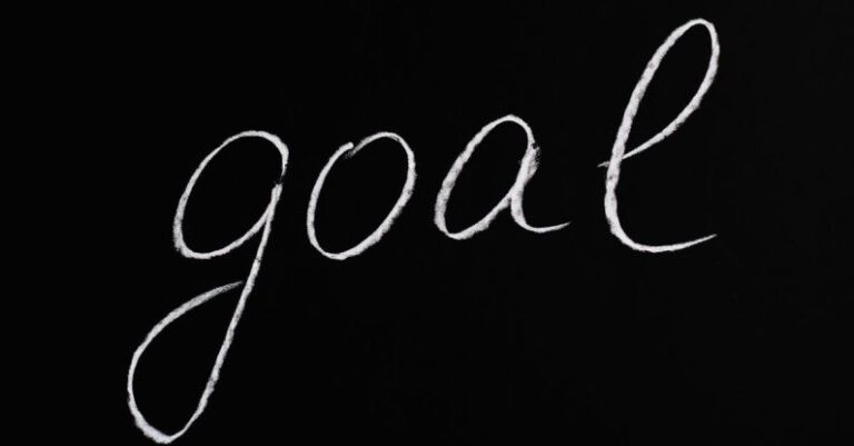 Language Barriers - Goal Lettering Text on Black Background