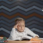 Online Learning - A Kid Reading a Book